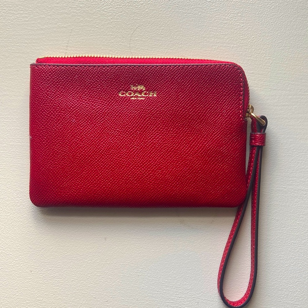 Coach brand corner zip wristlet in red